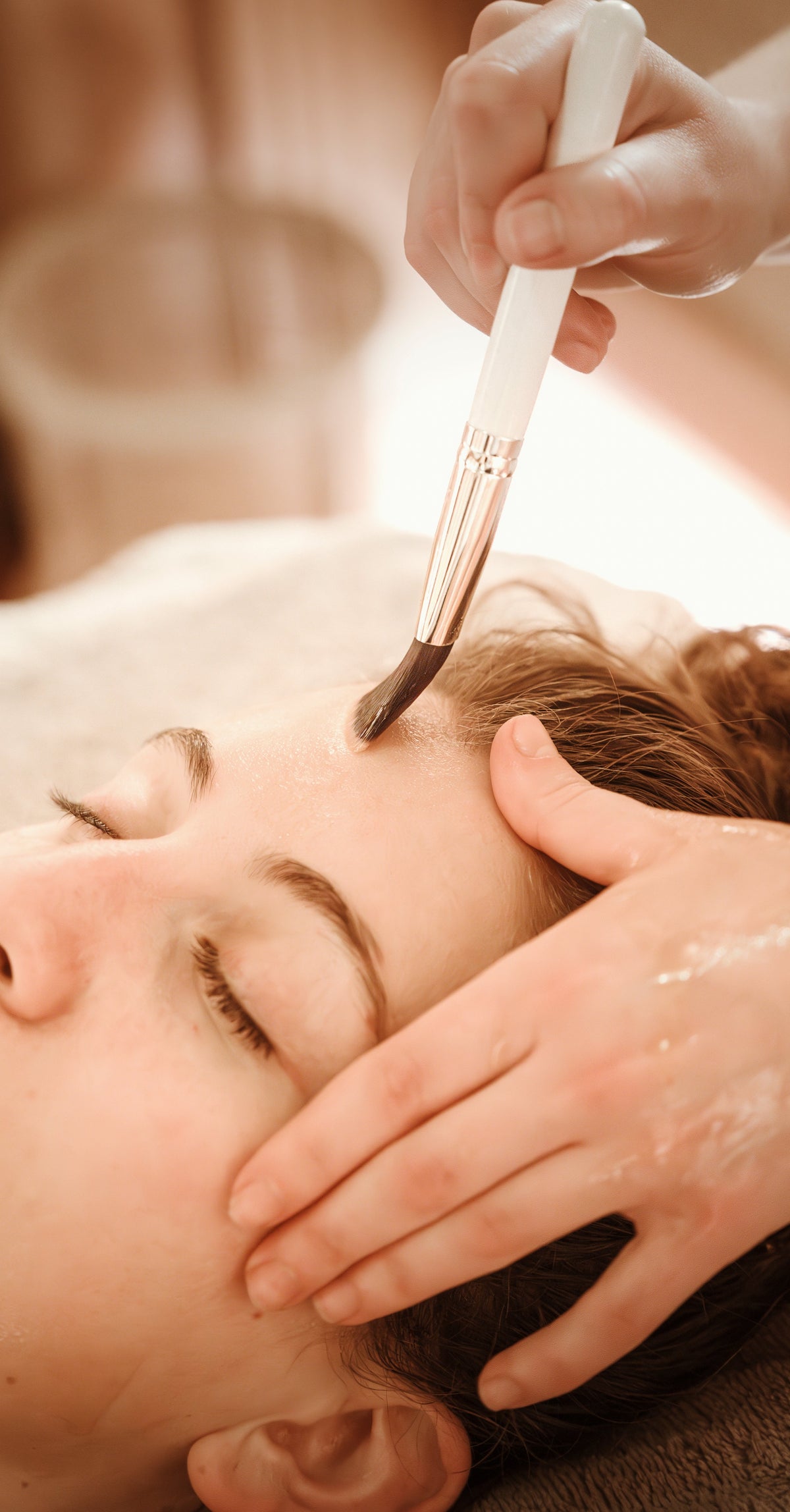 Personalized facial mask application at  Skin Chateau in Dallas