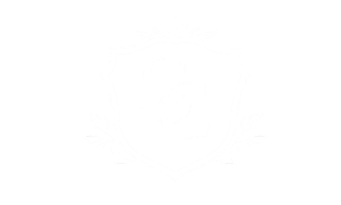 A very pale cream background with a faint white monogram-style crest centered on the image.